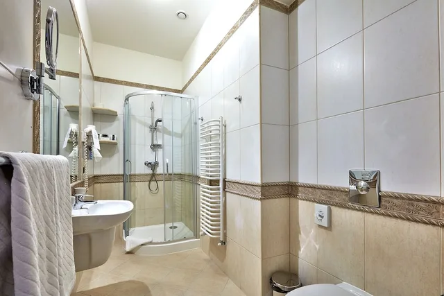 غرفة قياسية ثلاثية بسريرين منفصلين مع أريكة، Grand Hotel Stamary Wellness Spa 3/3