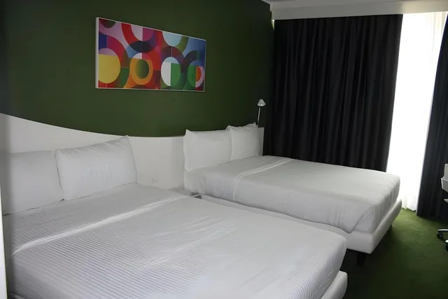 غرفة سوبيريور رباعية بسريرين كوين، Idea Hotel Milano Malpensa Airport 1/4