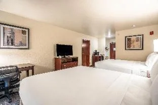 غرفة، Cobblestone Hotel & Suites - Two Rivers 8/10
