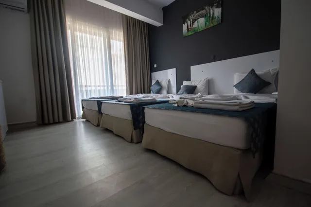 غرفة قياسية بسريرين منفصلين، Moonbow Beach Hotel 2/7