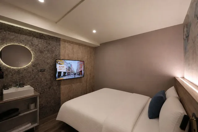 غرفة قياسية ثلاثية بسرير كوين وسرير فردي، Galaxy Mini Inn 2/4