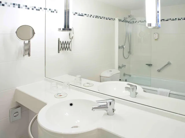 جناح بسرير فردي بمنطقة جلوس، MERCURE HOTEL HAMM 4/5