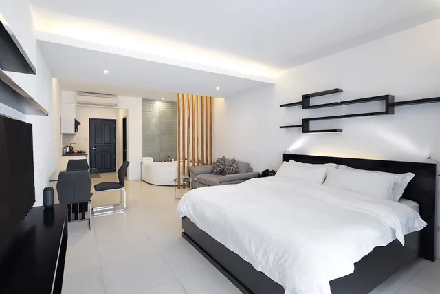 جناح تنفيذي بسرير كينج بجاكوزي بمطبخ، Winds Boutique Hotel 1/3