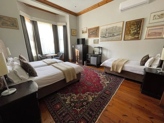 غرفة ديلوكس ثلاثية بثلاثة أسرّة، Ashanti Guest House Gardens Hostel 2/10