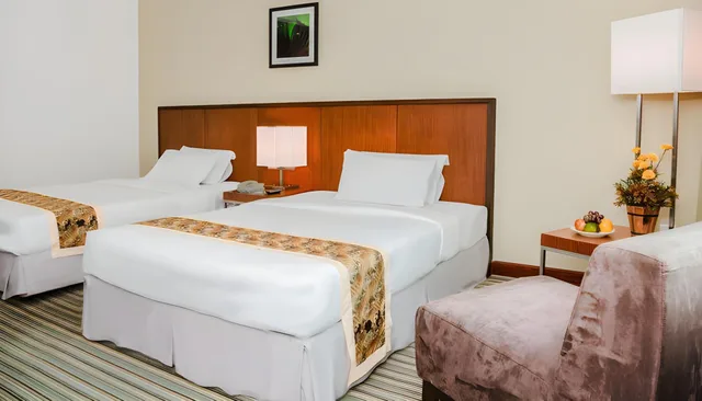 غرفة ديلوكس بسريرين منفصلين، Rh Hotel 1/2