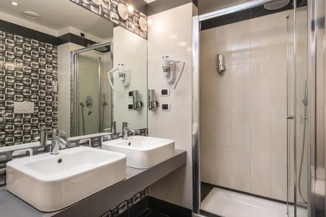 غرفة ديلوكس بسرير كوين، Noba Hotel e Residenze 4/4