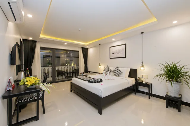 غرفة ديلوكس بسريرين منفصلين بشرفة، Gem Riverside Hotel Hoi An 5/10