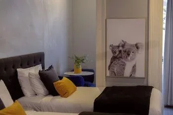 غرفة بسرير مزدوج وسرير فردي بشرفة بحمام مشترك، Bayswater Boutique Lodge 1/1