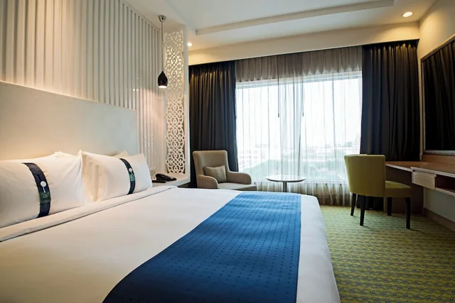 جناح بسرير كينج بمنطقة جلوس، HOLIDAY INN AMRITSAR RANJIT AVENUE 1/5