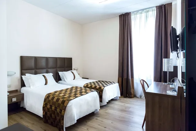 غرفة كلاسيكية ثلاثية بسرير كينج وسرير فردي، Best Western Hotel Liberta 4/5
