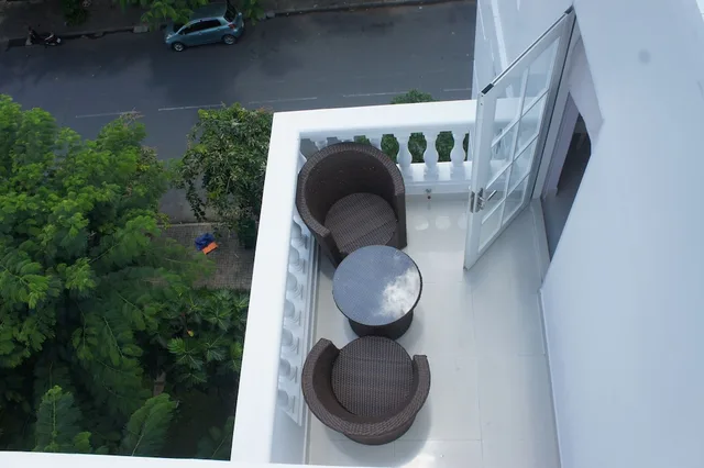 غرفة بزنس بسرير كينج بشرفة، Hotel L Odeon Phu My Hung 8/8