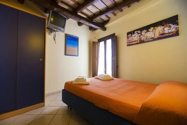 شقة عائلية بسريرين مزدوجين بغرفتي نوم مع أريكة، Residence Cortile Merce 3/8