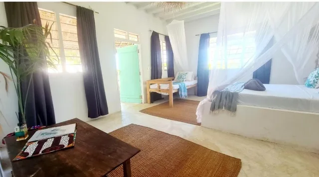 غرفة ديلوكس بسرير مزدوج مع سرير إضافي، Garden Beach Bungalows 10/10