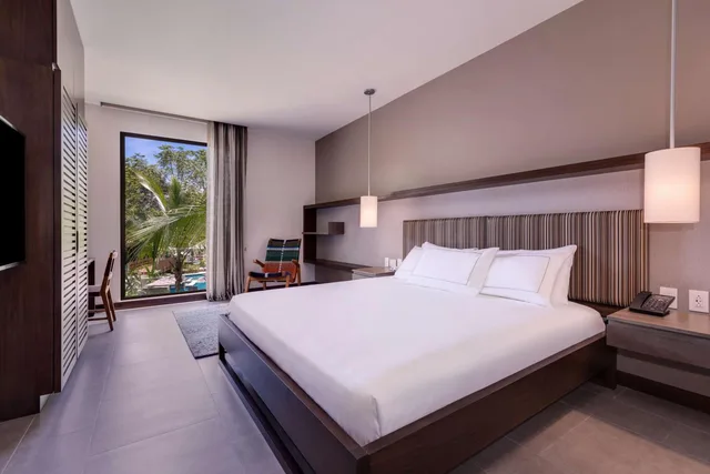 جناح بسرير كينج بغرفة نوم واحدة مع أريكة بمطبخ، Botanika Osa Peninsula, Curio Collection by Hilton 2/8