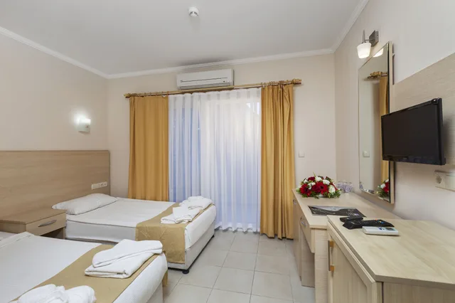 غرفة قياسية ثلاثية بسرير كينج وسرير فردي، Get Enjoy Hotels 4/10