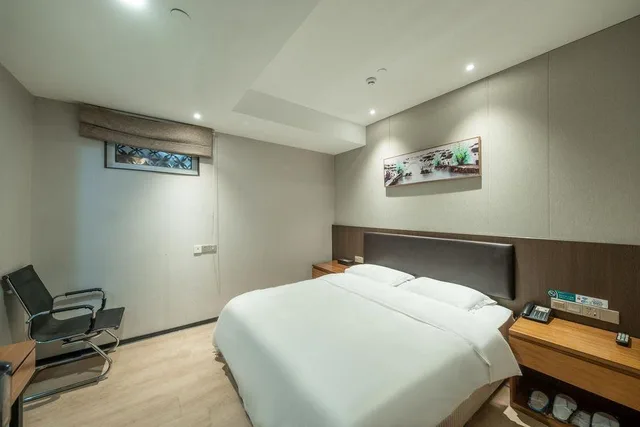 غرفة اقتصادية بسرير كوين، Qingdao Airport Fuhua Hotel 2/2