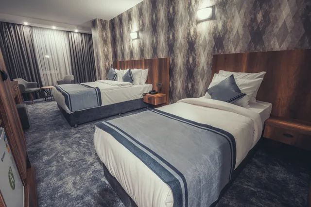 غرفة ديلوكس ثلاثية بسرير كوين وسرير فردي، Airport Express Hotel 4/10
