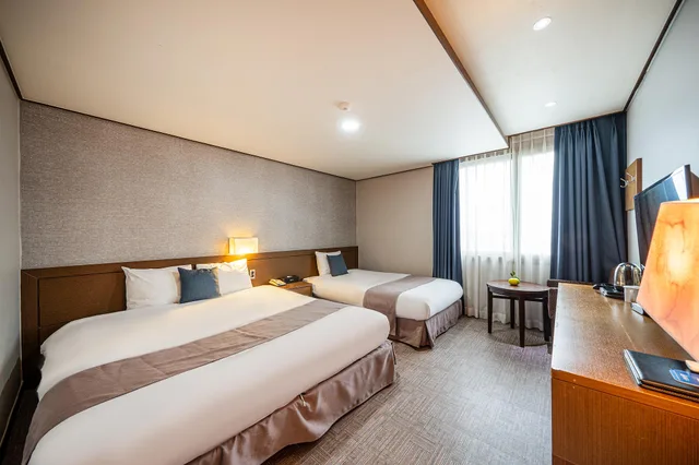 غرفة عائلية بسريرين منفصلين وسرير مزدوج وسرير فردي، Benikea Hotel Jeju 1/2