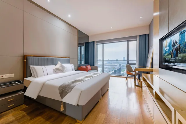 غرفة ديلوكس بسرير كينج، Yicheng Apartment Poly World Center 1/1