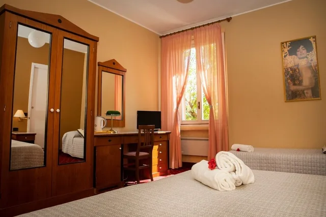 غرفة سوبيريور ثلاثية بسرير مزدوج وسرير فردي، Hotel Milano Pool & Garden 1/4