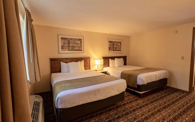 غرفة بسريرين كوين بمطبخ صغير، Baker Apos S Sunset Bay Resort 3/4