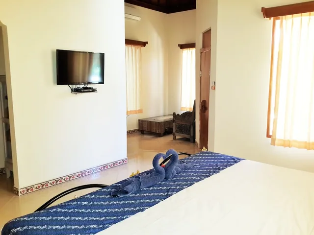 بنغل بسرير كينج بإطلالة على الحديقة، Geringsing Bungalows 3/7