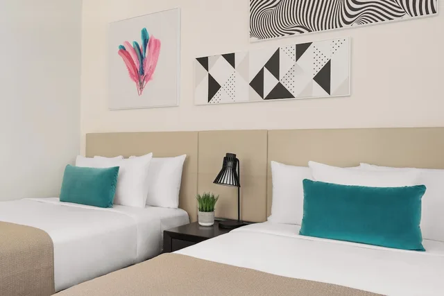 Suite, King Bed, 2 Double and Twin Beds, Corner, Hyde Beach House 5/8