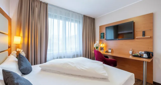 غرفة قياسية مفردة، PLAZA INN Braunschweig City Sud 3/6