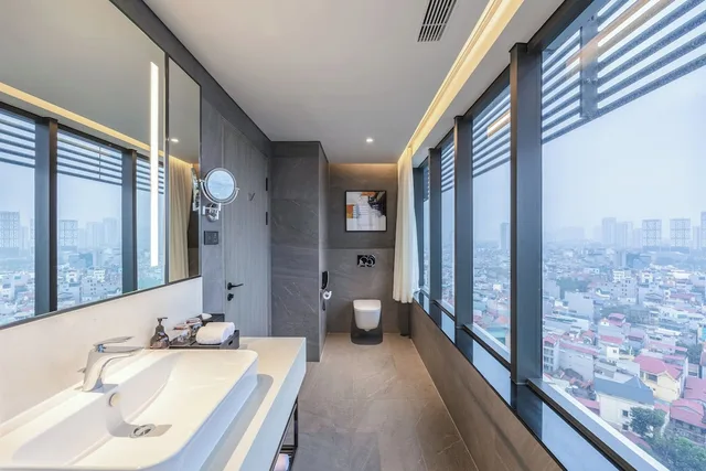 غرفة ديلوكس بسرير كينج وسرير فردي بغرفتي نوم، Fraser Residence Hanoi 6/10