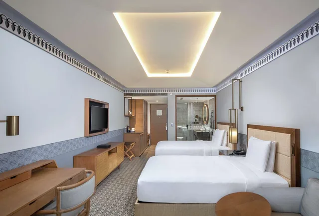غرفة ديلوكس بسريرين منفصلين بإطلالة على الحديقة بشرفة، Doubletree By Hilton Goa Panaji 1/5