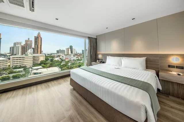Deluxe, King Bed, Golden Tulip Mandison Suites 1/2