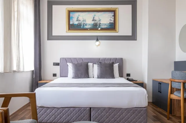 جناح عائلي بسرير فردي بإطلالة على البحر، Sur Hotel 3/10