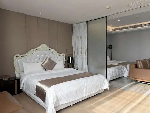 شقة ديلوكس بسرير كوين وسريرين مزدوجين بغرفتي نوم، Pengman International Apartment Hotel (Beijing Road Jiedeng Duhui) 3/8
