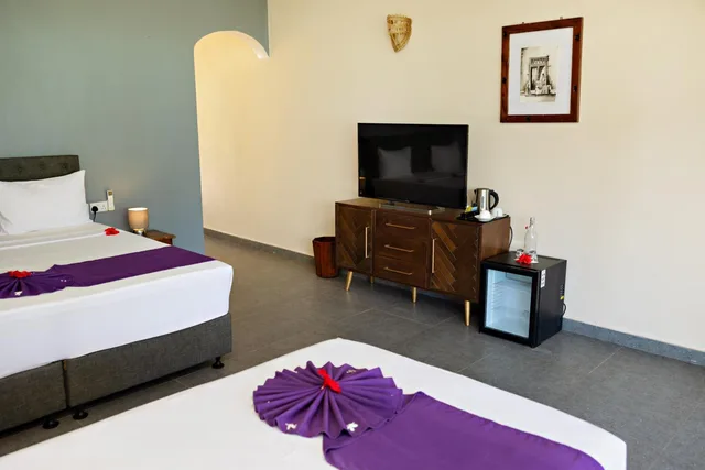غرفة بسرير كينج بإطلالة على البحر، Tanzanite Beach Resort 2/3