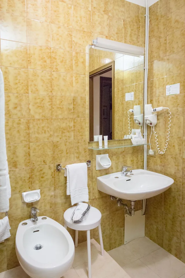غرفة كلاسيكية ثلاثية بسرير كينج وسرير فردي، Best Western Hotel Liberta 5/5