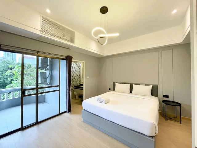 جناح سيغنتشر بسرير كينج وسريرين منفصلين، Boss Mansion Residence 2/6