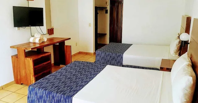 غرفة بسريرين مزدوجين بإطلالة على البحر، Costa Alegre Hotel And Suites 5/7