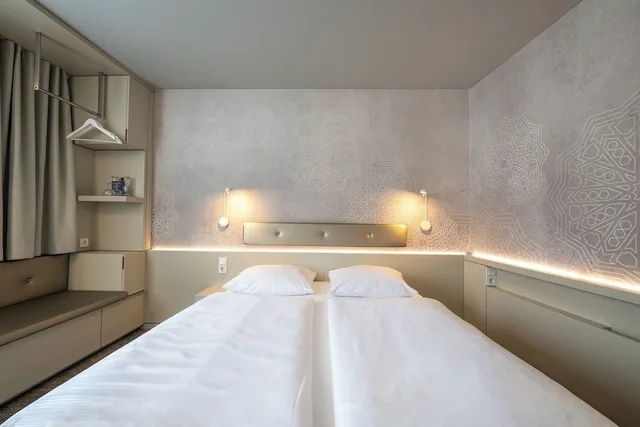 غرفة اقتصادية بسرير كوين، TOP KHR Stadthotel Munster 1/6