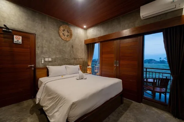 غرفة ديلوكس بسرير كوين بإطلالة على الحديقة، Joni Ubud Hostel 5/6