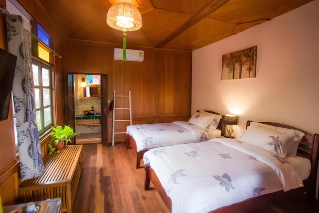 غرفة بسريرين منفصلين في طابق مرتفع، Pao Come Boutique House 1/2