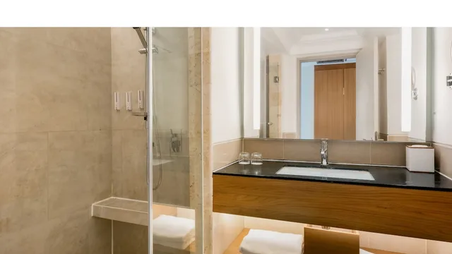 غرفة غراند بسريرين منفصلين بإطلالة على الحديقة بشرفة، Mustika Yogyakarta Resort & Spa 4/5