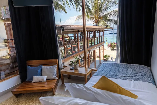 غرفة ثلاثية بثلاثة أسرّة بإطلالة على البحر، Pesona Beach Resort Spa 7/10