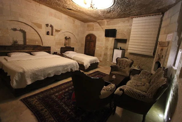 غرفة ديلوكس ثلاثية بسرير مزدوج وسرير فردي، Family Cave Suites Hotel 2/3