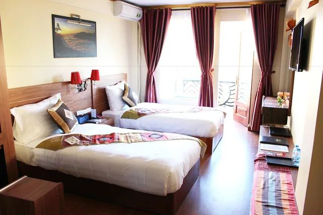 غرفة ديلوكس بسريرين منفصلين بإطلالة على المدينة، Sapa Dragon Hotel 2/3