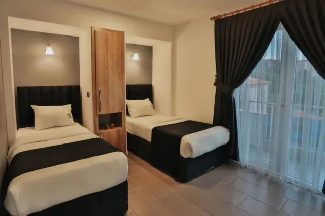 جناح كومفورت بسريرين منفصلين وسرير كينج بإطلالة على البحر بغرفتي نوم، Sweet Home Suite Hotel 2/9