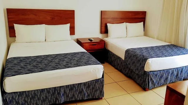 غرفة بسريرين مزدوجين بإطلالة على البحر، Costa Alegre Hotel And Suites 1/7