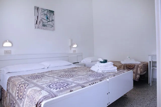 غرفة اقتصادية ثلاثية بسرير كوين وسرير فردي، LAGOMAGGIO HOTEL 2/5