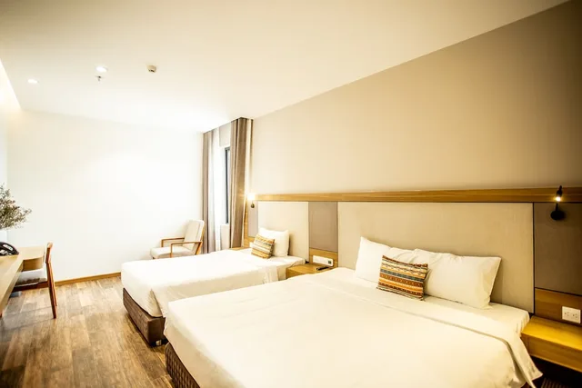 غرفة ديلوكس ثلاثية بسرير كينج وسرير فردي، Thanh Mai Hotel 2/3