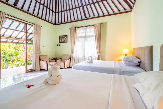 غرفة ديلوكس تنفيذية، Taman Surgawi Resort And Spa 1/2