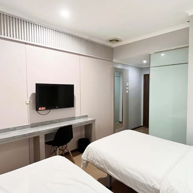 غرفة ديلوكس بسرير مزدوج أو سريرين منفصلين، G Hotel Pontianak 5/8
